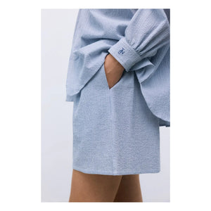 the new society - Cloe Cotton Short Skirt | Light Blue