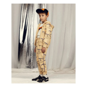Mini Rodini - Jogger de algodón orgánico Alien City | Beige