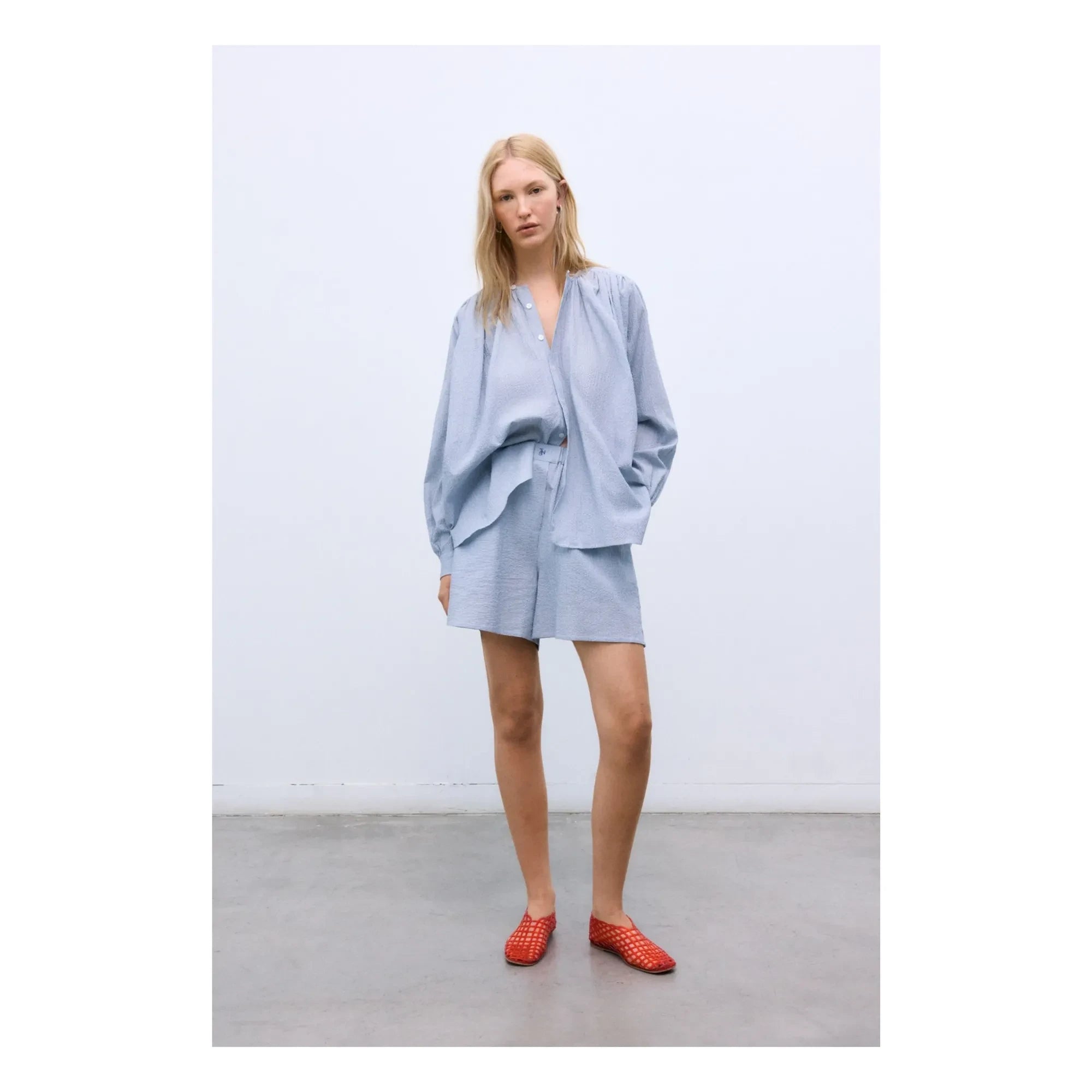 the new society - Cloe Cotton Short Skirt | Light Blue