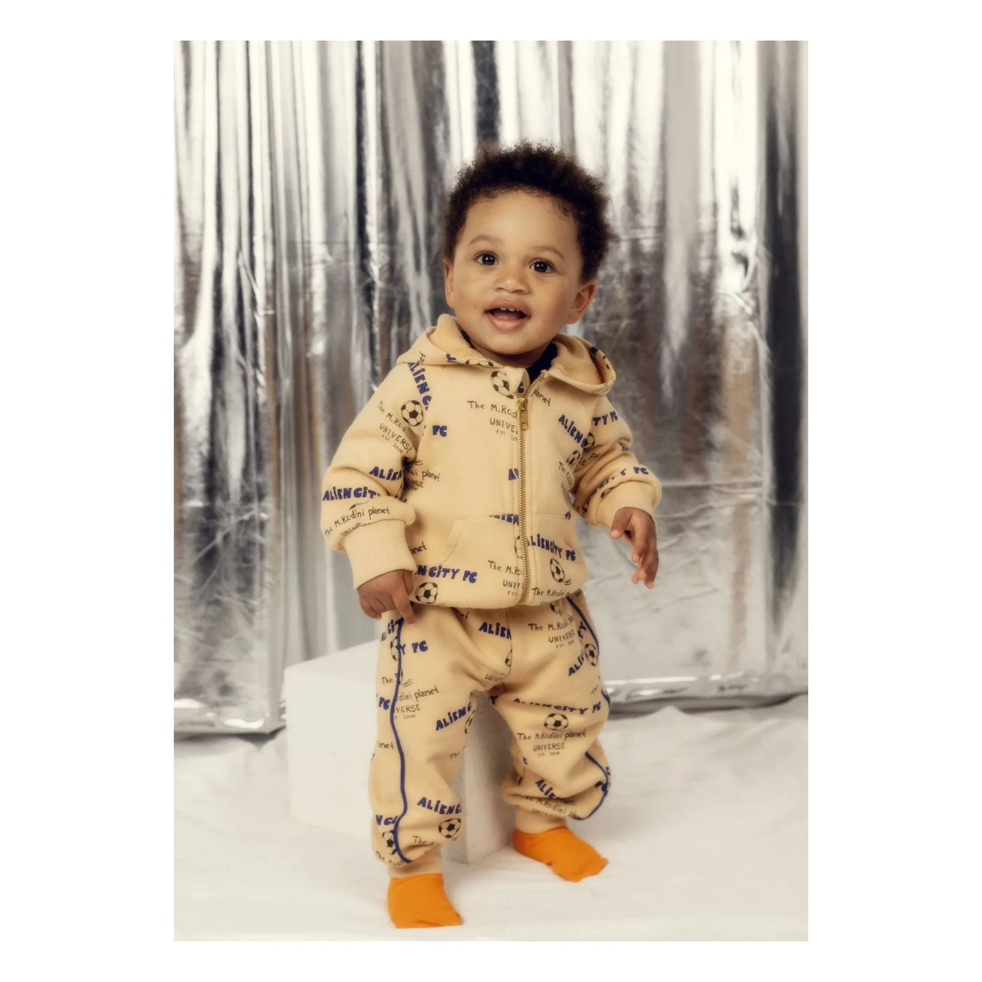 Mini Rodini - Jogger de algodón orgánico Alien City | Beige