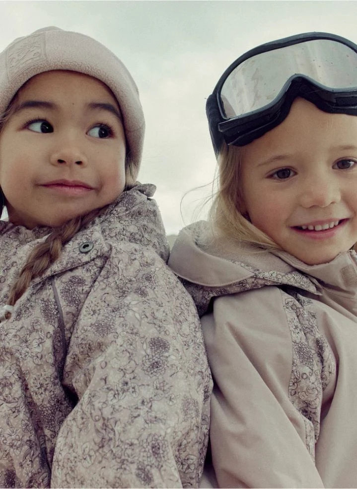 Wheat - Melte Fleurs Skioverall aus recycelten Fasern | Hellrosa