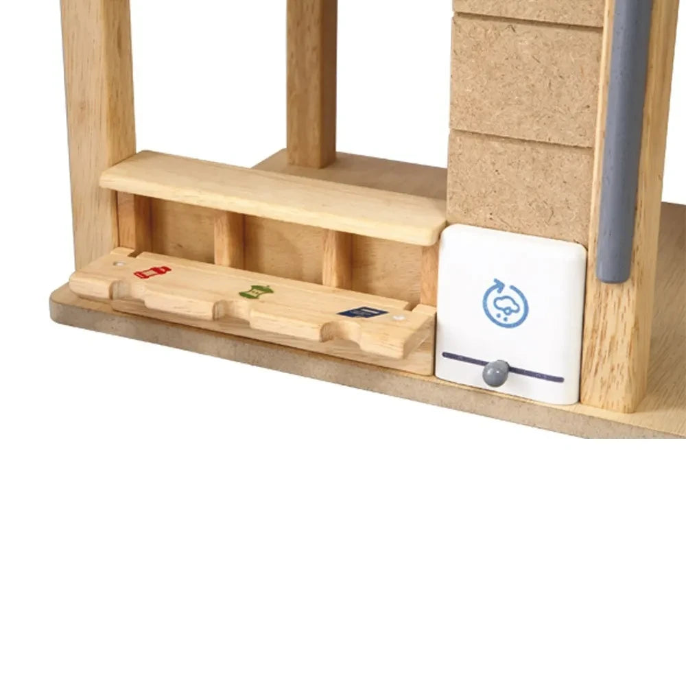 Plan Toys - Umweltfreundliches Puppenhaus mit Möbeln
